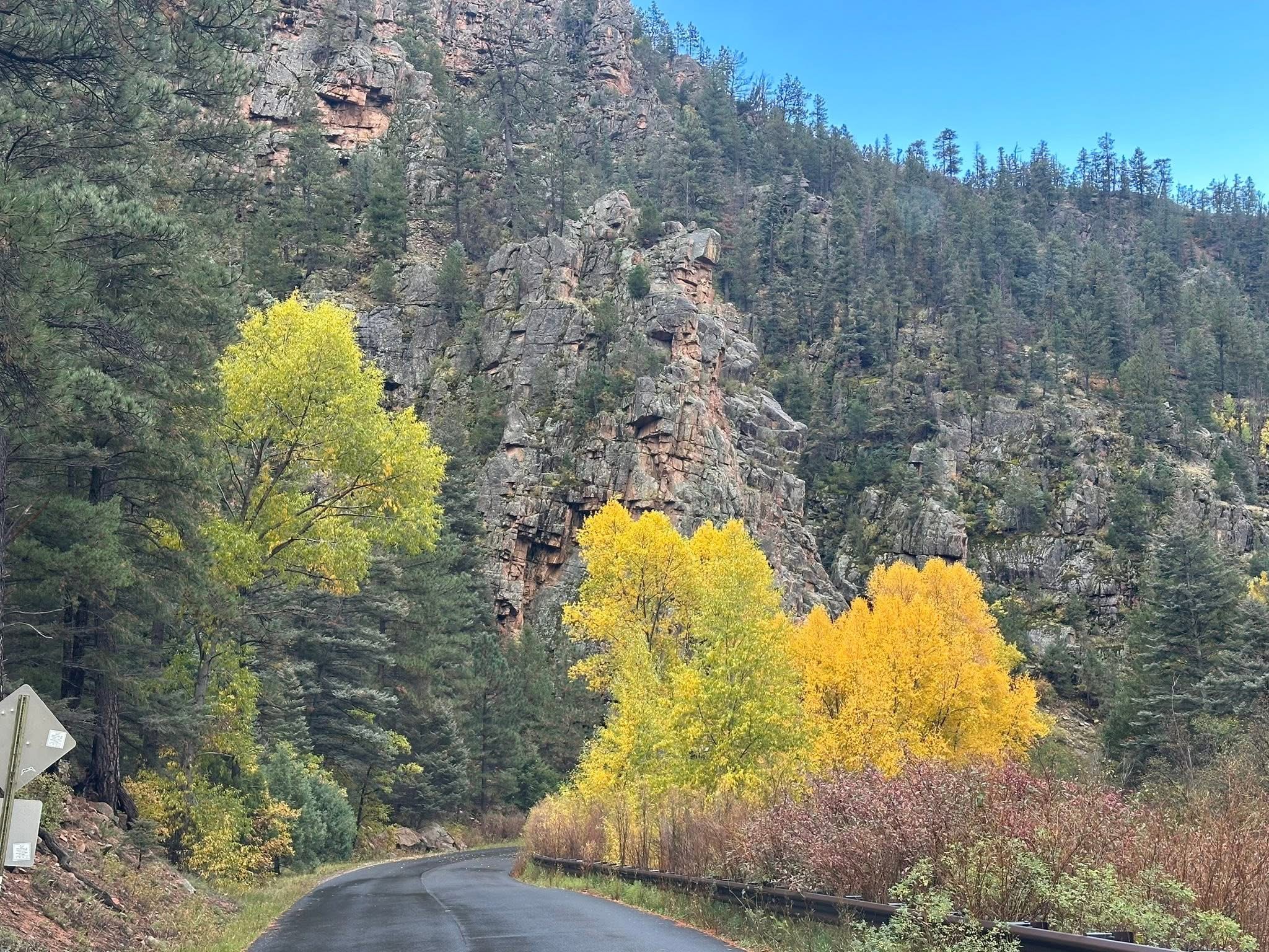 Highway 63 Pecos Canyon fall colors with dramatic canyon walls